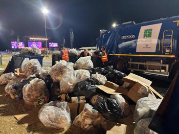 Pile Of Rubbish Next To Bin Truck