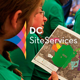 2015 DC Site Services Event Calendar - DC Site Services event staff in a briefing at the Glastonbury Festival