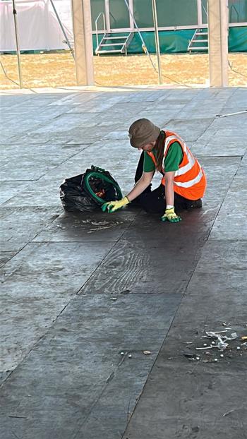 Crew Member Cleaning Floor (1)