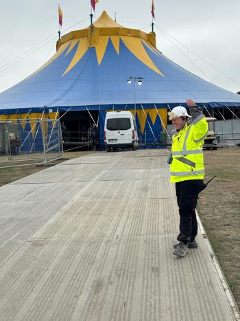 Crew Member Infront Of Tent (2)