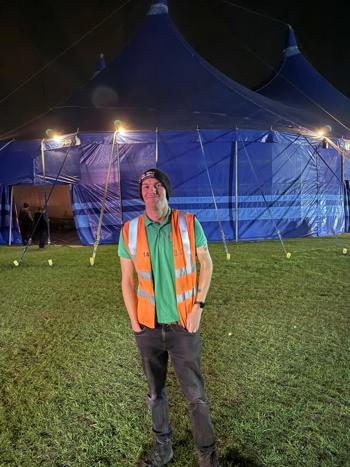 Zak Read Infront Of Tent