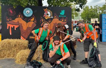 John, Matt, Nathan And Olivia Posing By Sign Cropped