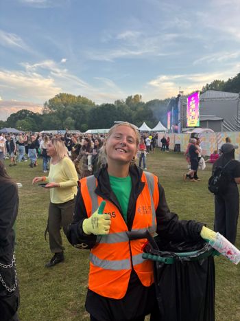 Lauren Coley Holding Bin Bag Giving A Thumbs Up
