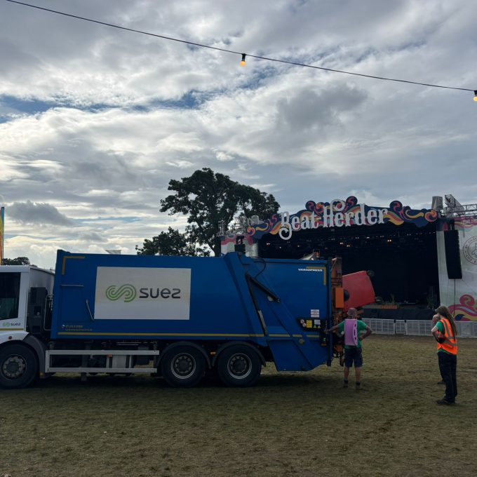 Bin Truck With Stage In Background