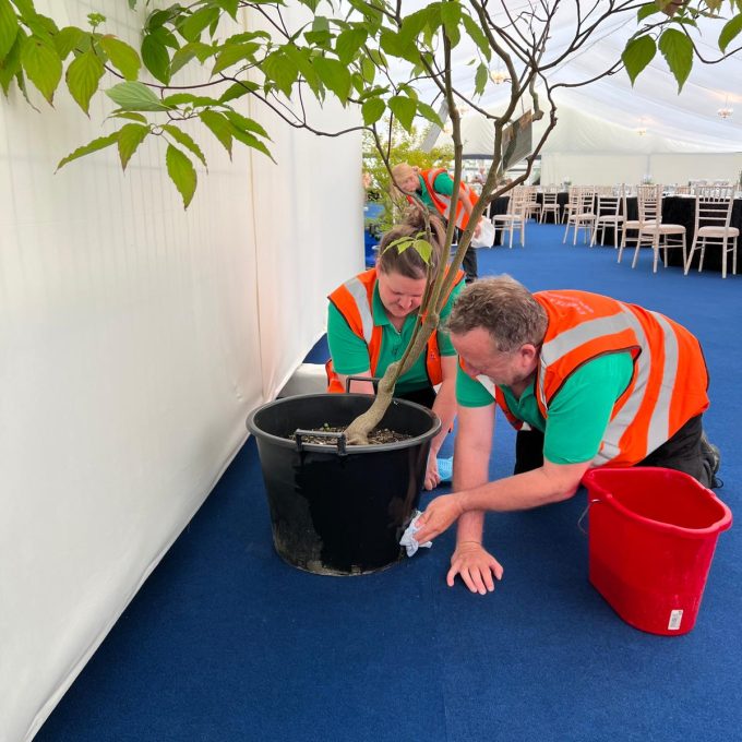 crew cleaning plant pot 2.JPG