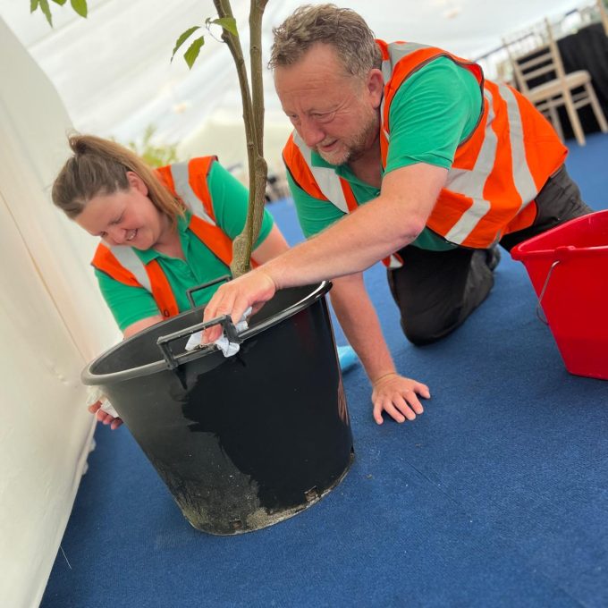 crew cleaning plant pot 3.JPG