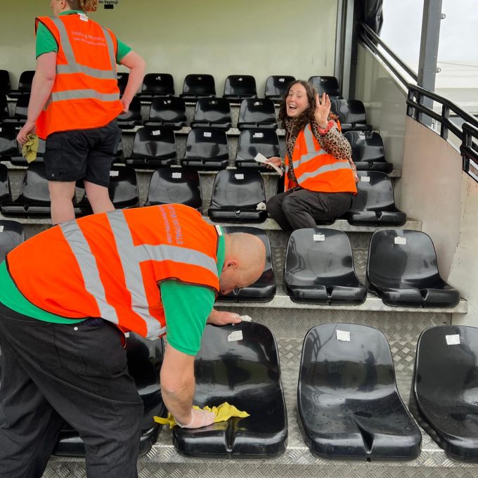 crew cleaning seats 2.JPG