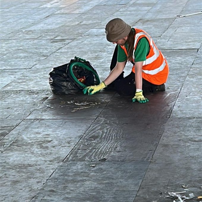 Crew Member Cleaning Floor (1)