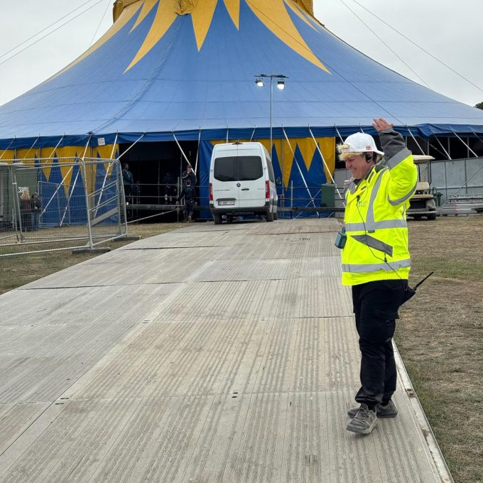 Crew Member Infront Of Tent (2)