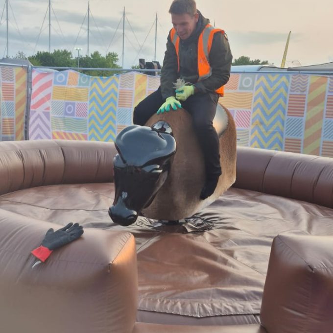 Crew Member On Bucking Bronco
