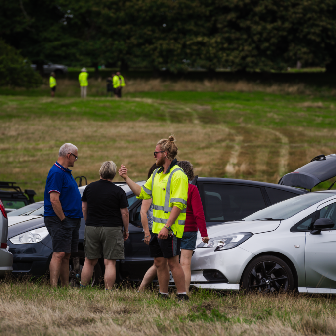 crew member talking to public.png