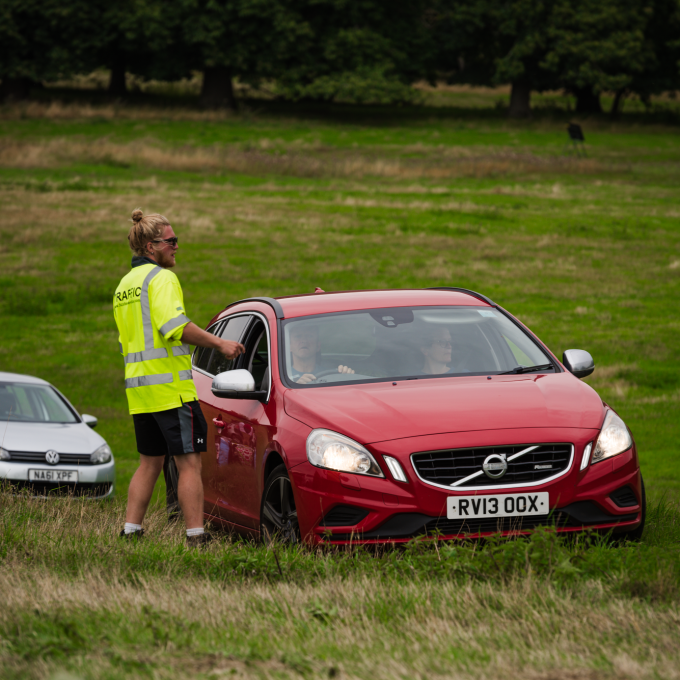 crew talking to car.png