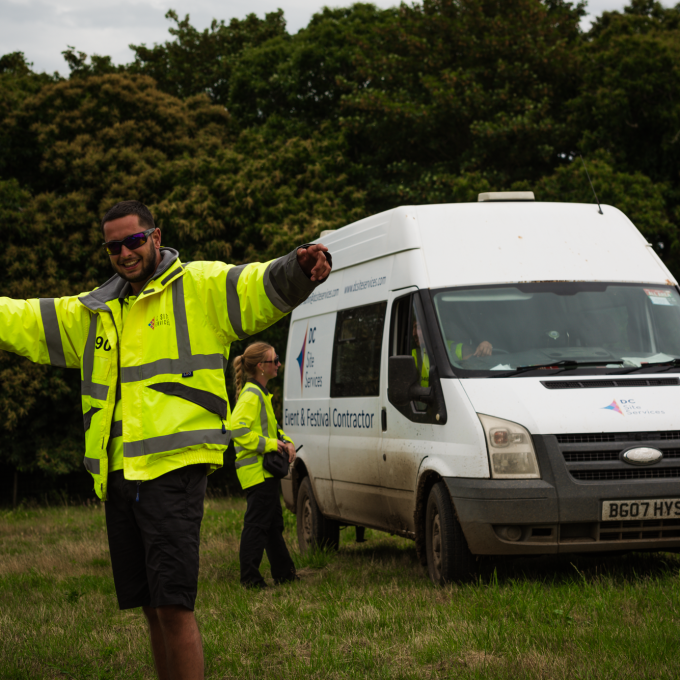 crew with dc van arms out.png