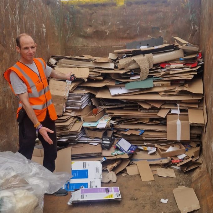 David With Stacked Cardboard