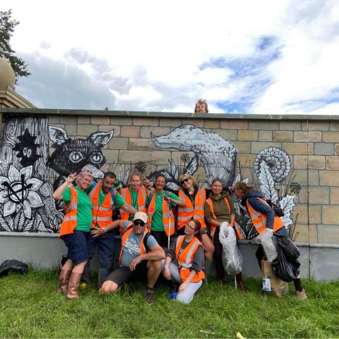 group shot infront of wall.JPG