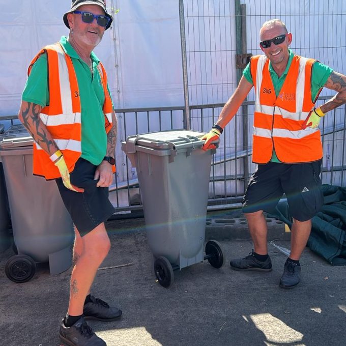 John And Steve Smiling By Bin