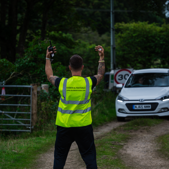 motioning cars through.png