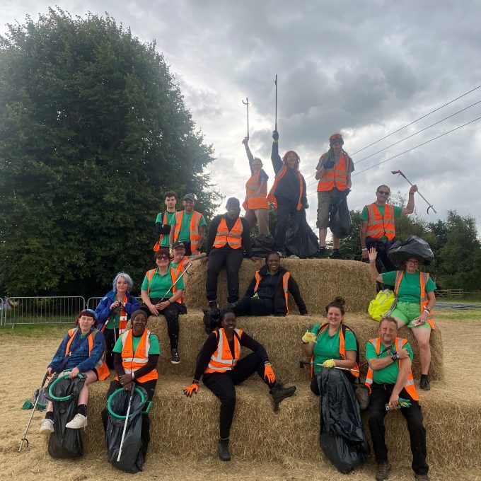 Staff posing on Hay.jpg