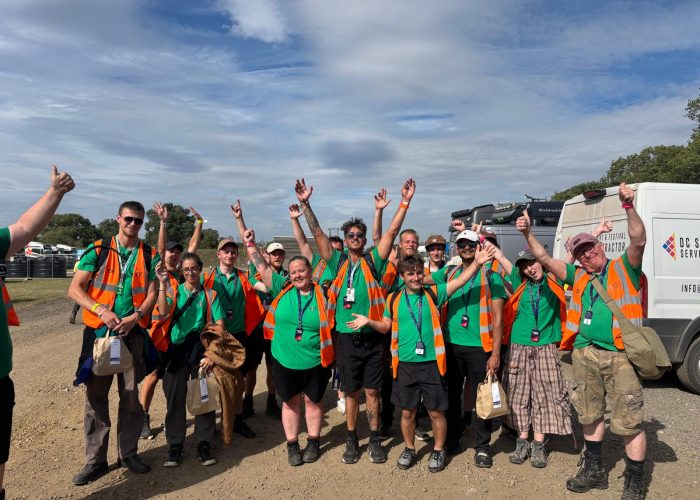 Crew with arms in the air